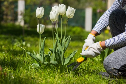 Gardening crew providing a written quote on-site